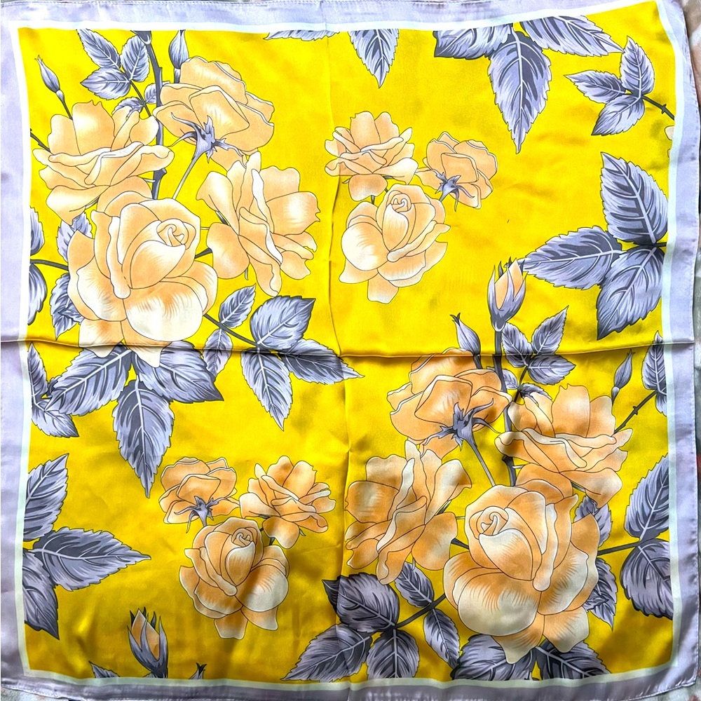 Silky feel polyester square scarf. 26.5 inches across.
